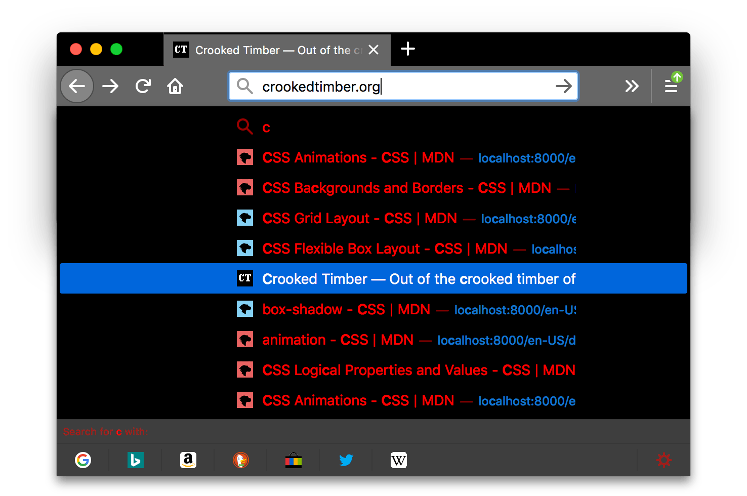 Firefox ist schwarz. Die Tabs und die URL-Leiste sind heller grau mit weißen Symbolen und weißem Text. In einem Popup mit Suchergebnissen ist der Text der Einträge rot und hebt sich gut vom schwarzen Hintergrund des Popups ab.
